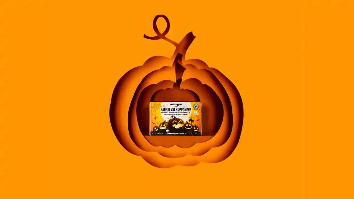 Halloween-teemaiset pakkaukset, joissa on kurpitsaleikkausdesign.